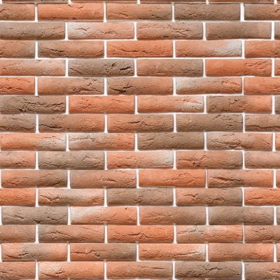 Parede com tijolos vermelhos texturizados e espaçamento claro