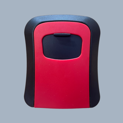 Dispositivo eletrônico preto e vermelho com botão