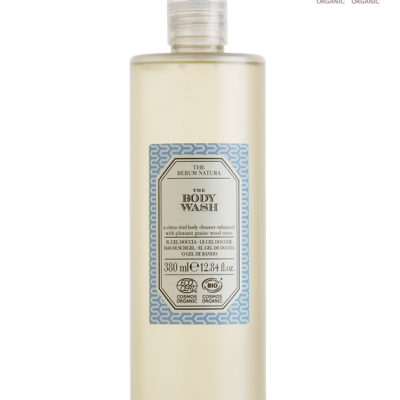 Frasco de gel de banho translúcido com rótulo azul e texto preto