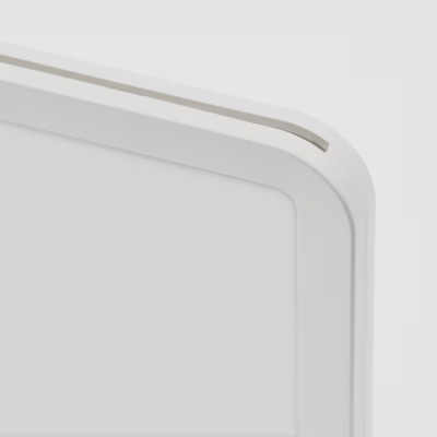 Canto arredondado de objeto branco retangular com ranhura