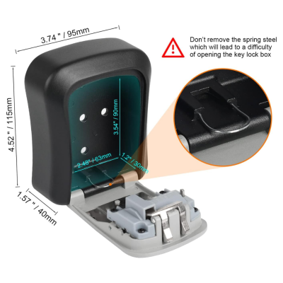 Caixa de chave preta e cinzenta com tampa aberta e instruções ao lado.
