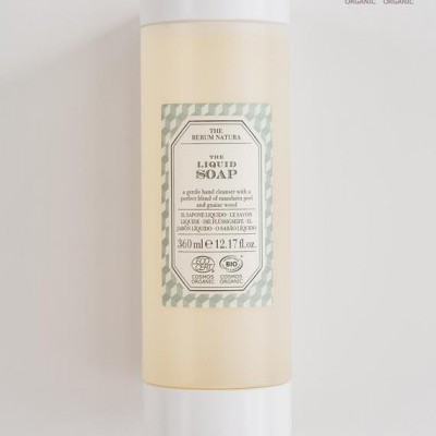 Frasco de sabão líquido com rótulo e tampa branca