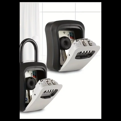 Porta-chaves numérico preto e branco, com chaves e cartões, em ambiente interior