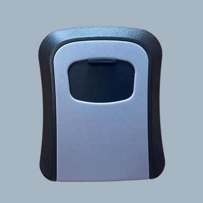 Dispositivo retangular cinza prateado com bordas pretas e aba preta