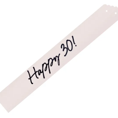 Faixa decorativa rosa claro com texto 'Happy 30!' em preto