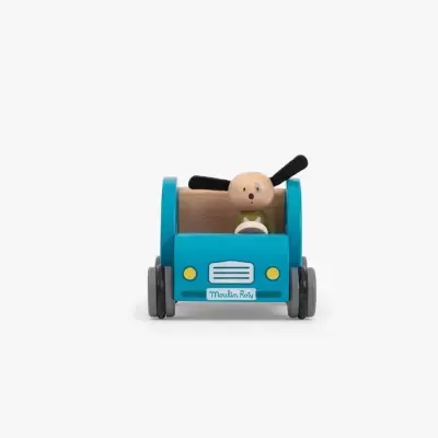Carrinho de brinquedo azul com figura de cão ao volante