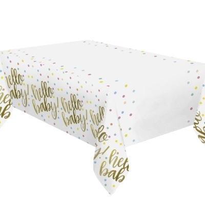 Toalha de mesa branca com confetes coloridos e texto 'hello baby!' em dourado nas bordas