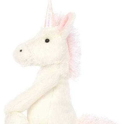 Pelúcia de unicórnio branco com crina e cauda rosa clara