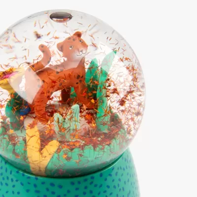 Globo de neve com tigre laranja e base verde