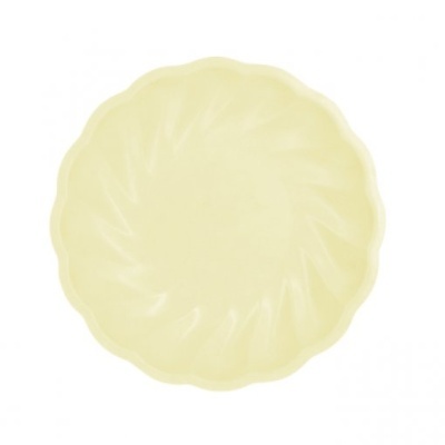 Prato redondo creme com bordas onduladas e padrão em espiral