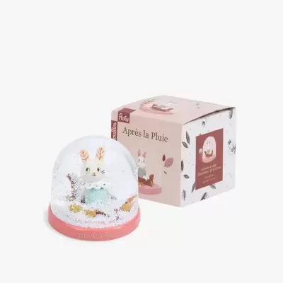 Globo de neve com coelho e caixa rosa