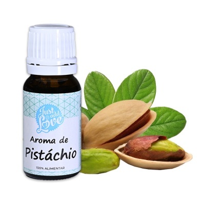 Frasco de aroma de pistáchio com rótulo e pistáchios ao lado