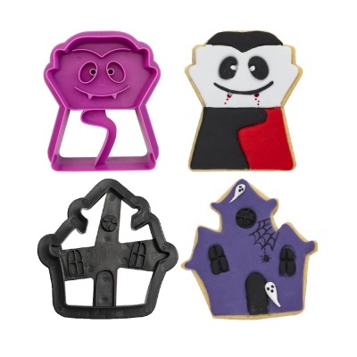 Cortadores de biscoitos e biscoitos decorados com tema de Halloween