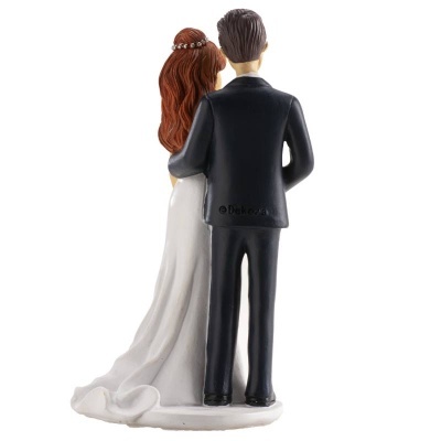 Figura de bolo de casamento de noiva e noivo vistos de costas