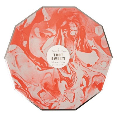 Embalagem octogonal vermelha e branca com etiqueta circular central