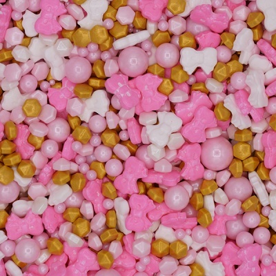 Confeitos decorativos rosas, brancos e dourados para bolos em várias formas.