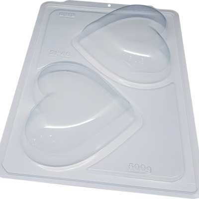 Molde de plástico transparente com duas cavidades em forma de coração e inscrições