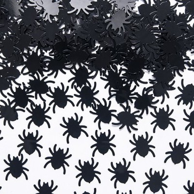 Pequenas aranhas decorativas de plástico preto sobre fundo branco