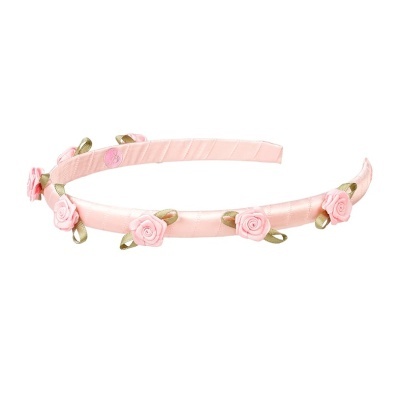 Arco de cabelo cor-de-rosa com flores pequenas de tecido.