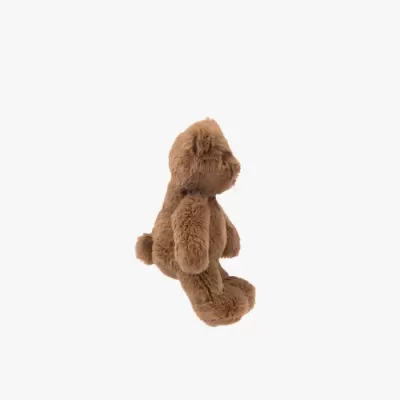 Urso de peluche castanho visto de lado