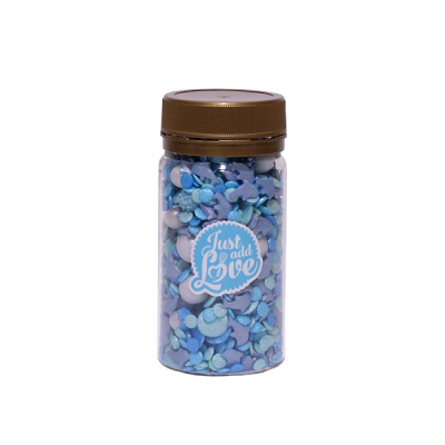 Frasco transparente com confeitos azuis e etiqueta 'Just add Love'