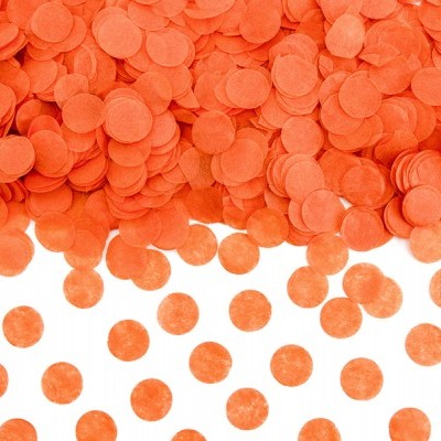 Confetes circulares cor de laranja sobre fundo branco