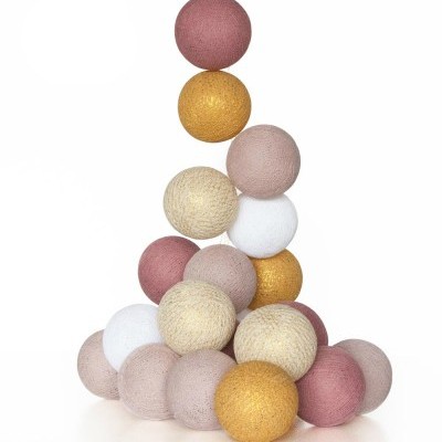 Bolas decorativas empilhadas em várias cores e texturas