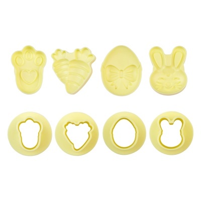 Conjunto de cortadores de massa amarelos com formas de animais e objetos da Páscoa
