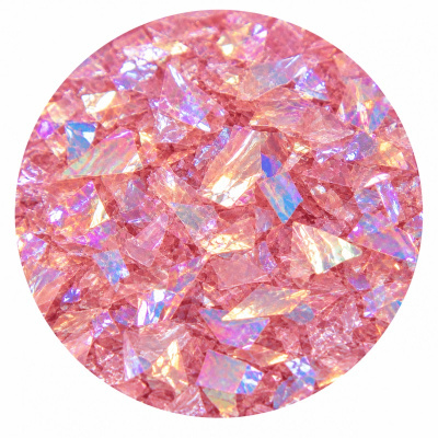 Fragmentos de glitter cor-de-rosa com brilho iridescente num círculo