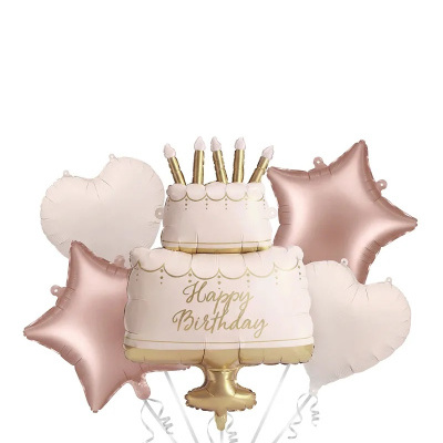 Balões de aniversário em formas de bolo, estrelas e corações nas cores rosa, branco e dourado