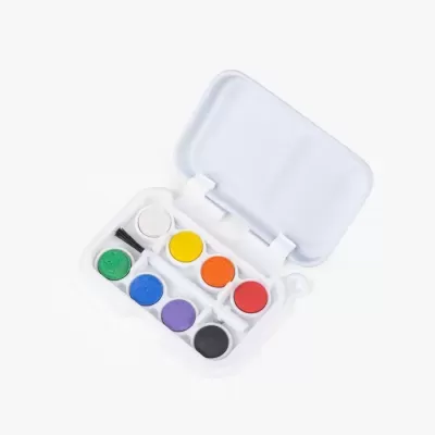 Estojo branco aberto com tinta aquarela colorida e pincel.
