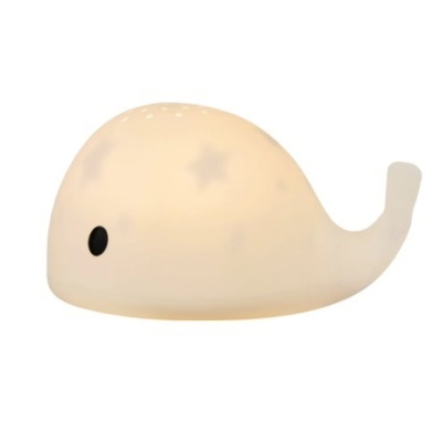 Lâmpada em forma de baleia creme com estrelas e olhos pretos