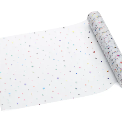 Rolo de papel translúcido com padrões coloridos