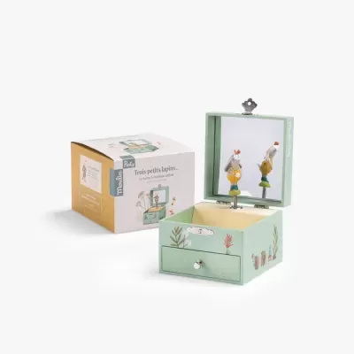 Caixa de música verde com espelho e figura de coelho