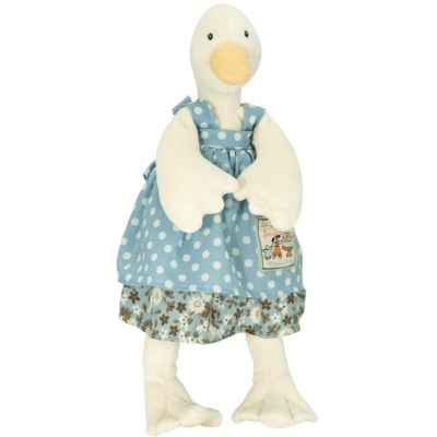 Peluche de pato com vestido azul de bolinhas e saia floral