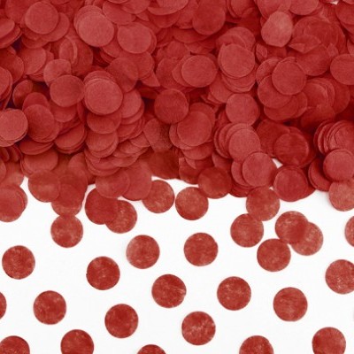Confetes redondos de papel vermelho em fundo branco