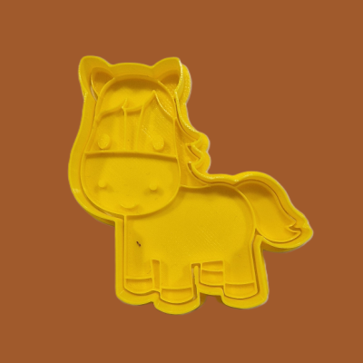 Forma amarela em formato de cavalo com detalhes em plástico