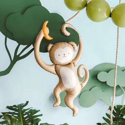 Balão de macaco com banana e decoração de folhas e bolas verdes