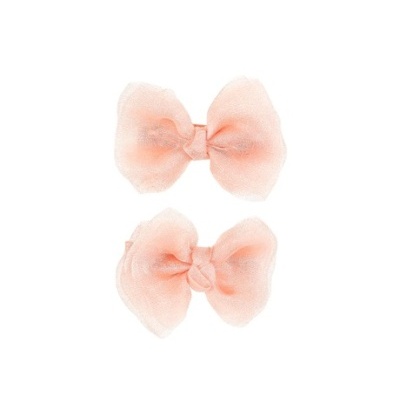 Dois laços cor-de-rosa em tecido tulle com textura suave