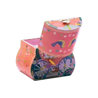 Caixa decorativa rosa e colorida com motivos de pássaros, flores e bicicletas.