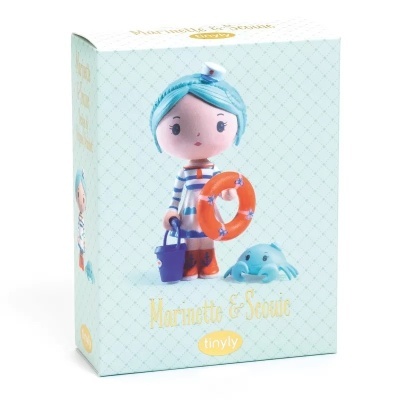 Embalagem de brinquedo Marnette & Spookie com figura infantil vestida às riscas e polvo azul