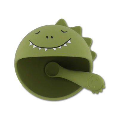 Conjunto tigela e colher de silicone verde com design de dinossauro sorridente