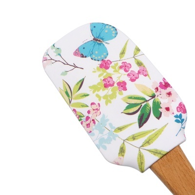 Espátula de cozinha com cabo de madeira e motivo floral colorido