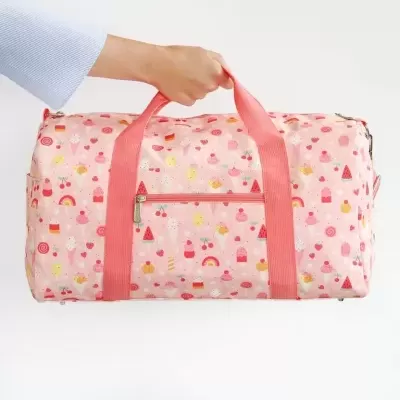 Mala de viagem cor-de-rosa com estampado de gelados e frutas e alças largas cor-de-rosa