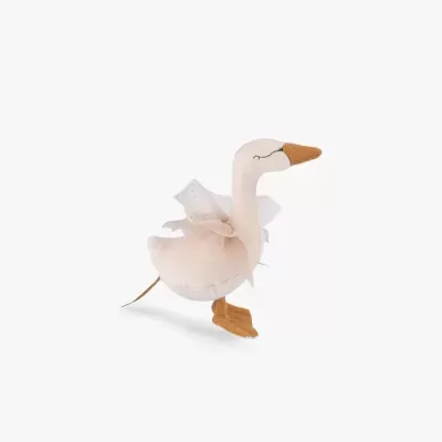 Pelúcia cisne cor de rosa claro com bico e pés castanhos e laço branco