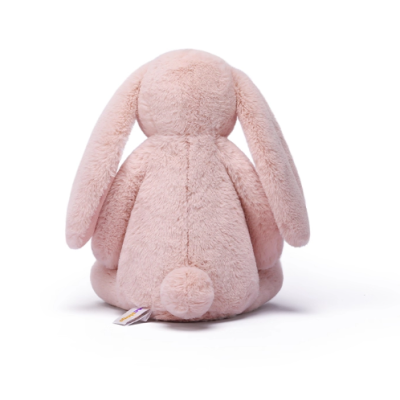 Ursinho de pelúcia cor-de-rosa visto de costas
