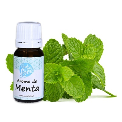 frasco de aroma de menta com folhas frescas