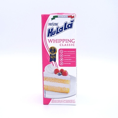 Caixa rosa e branca de Whipping Classic da Pristine Hula La com imagem de bolo e chantilly