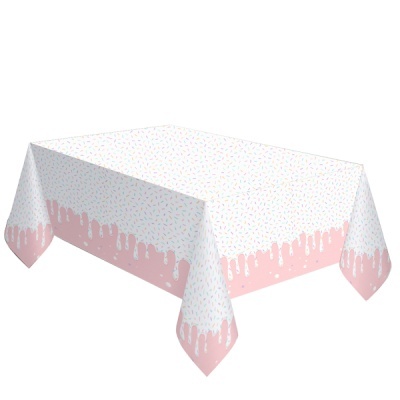 Toalha de mesa branca e rosa com padrão de gotas coloridas