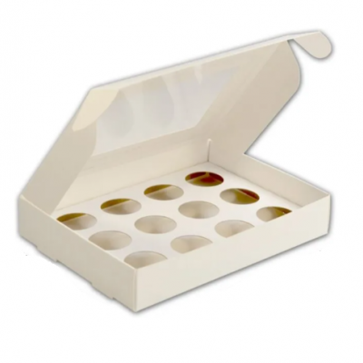 Caixa branca de cartão com orifícios circulares para bolachas vazia